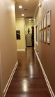 Other end of hallway towards office and kitchen