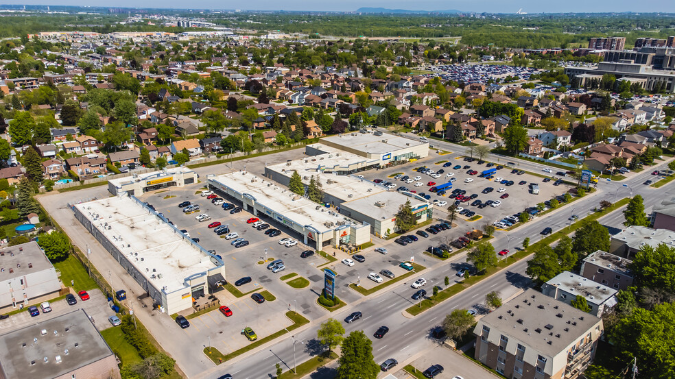 1857 Boul René-Laennec, Laval, QC en alquiler - Foto del edificio - Imagen 2 de 25