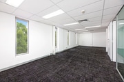 Carpeted Open Plan Office Space with Natural Light